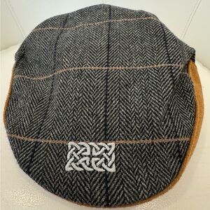 Patrick Francis Ireland grey tweed celtic knot flat cap.